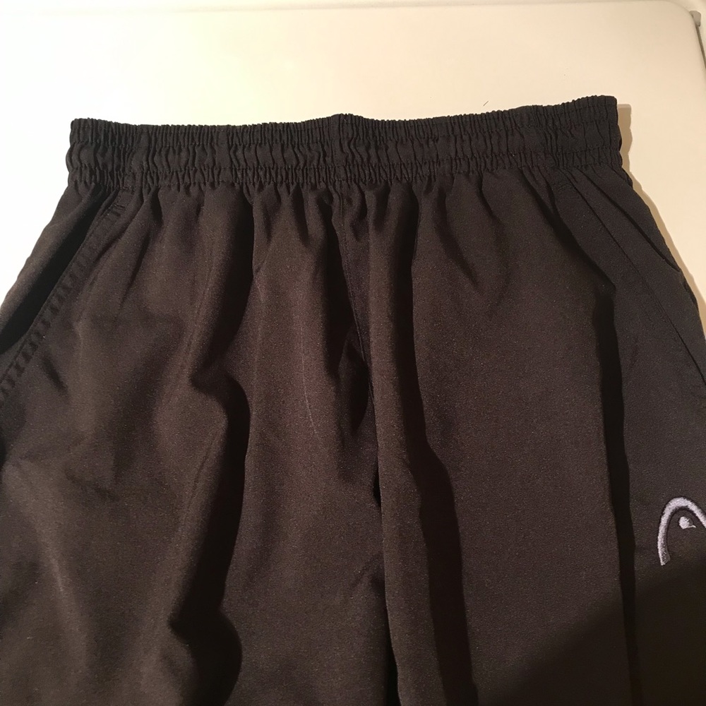 Lightweight athletic pants, size medium, unisex. Fits approx 5 feet, 7 in. tall.